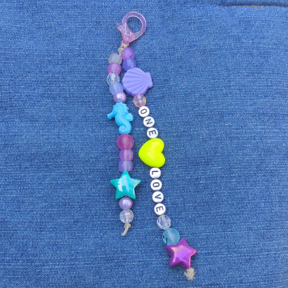 One Love UV reactive purse charm, handmade